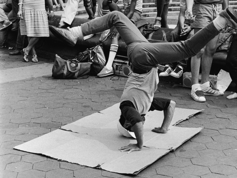 Dude break dancing on corrugated box